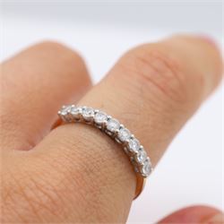 14ct gold diamond half eternity ring, set with nine blossom cut diamonds, stamped 14K, total diamond weight 0.54 carat, with GGI certificate