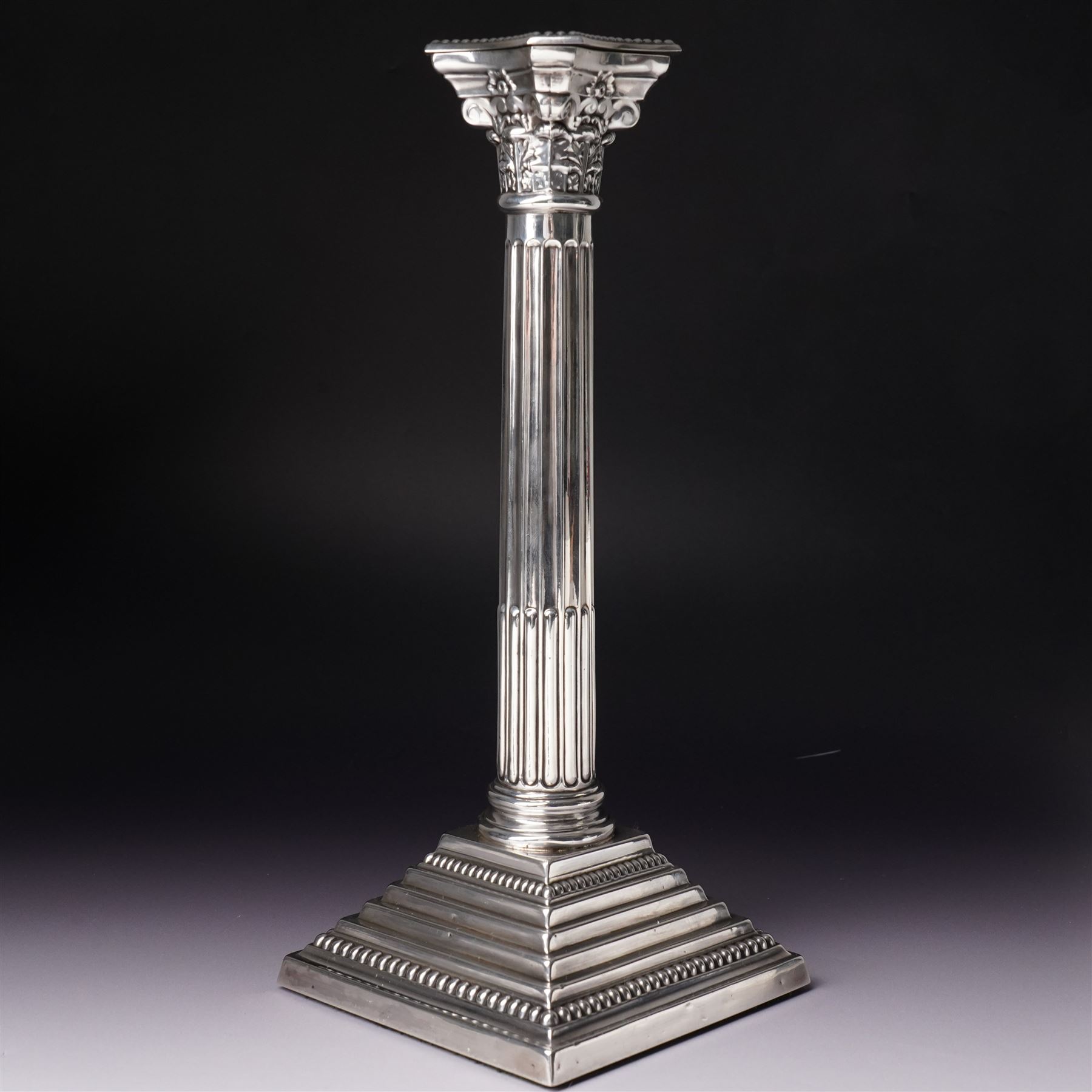 Pair of silver Corinthian column candlesticks with stepped square bases H30cm Birmingham 1968 Makers mark L.D.Ld