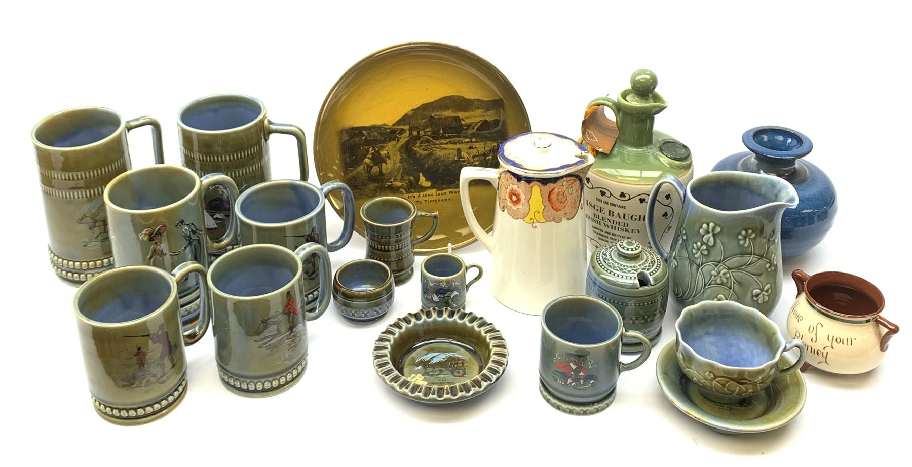 A group of fifteen Irish Wade porcelain, to include tankards, cups, small dishes, etc., together with a Ridgways plate, and four other pieces of Irish pottery. 


Ridgways plate and four other Irish items