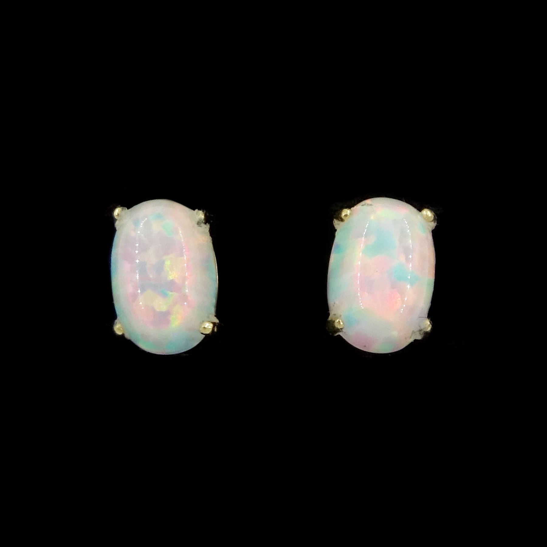 Pair of 9ct gold opal stud earrings