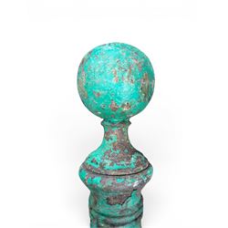 19th century circular cast iron gate post with finial, painted in distressed green finish