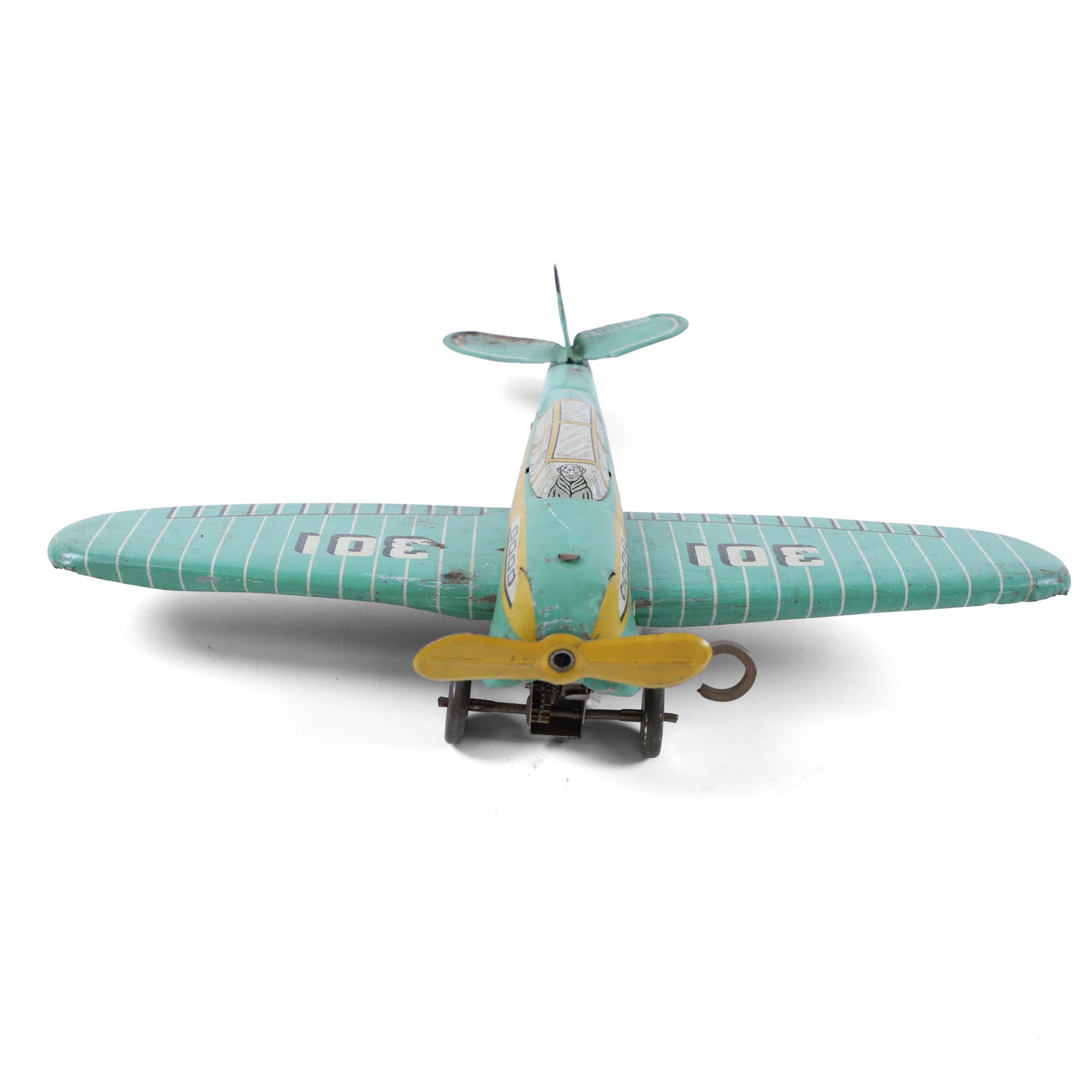Four tinplate model aeroplanes, comprising Mettoy clockwork single-engined model no. K3520 in yellow with blue stripes and red engine cowl, Mettoy clockwork monoplane with silver and red lithographed body, Wells of London clockwork aeroplane no. 301 in green with lithographed details and a  small German bi-plane in yellow, three clockwork examples with key