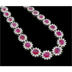 18ct white gold ruby and diamond necklace, thirty-seven oval cut ruby and round brilliant cut diamond clusters, total ruby weight approx 23.25 carat, total diamond weight approx 11.85 carat