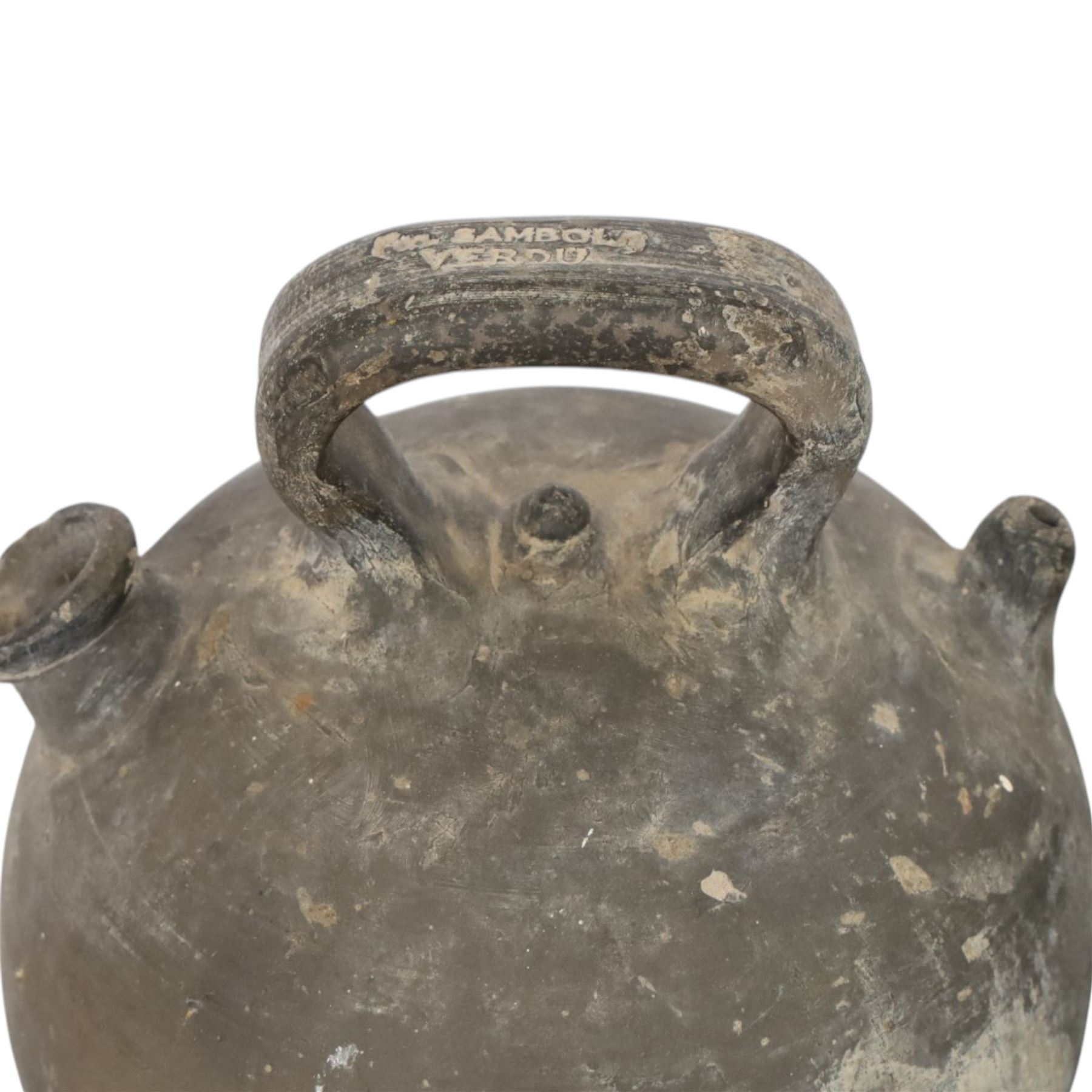 Four 20th century Spanish blackened earthenware botijo or cruche vessels, each of typical baluster form with central loop handle and opposing spout, impressed marks to handles, tallest example H31cm