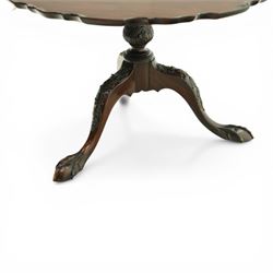Late 19th century mahogany piecrust occasional table, circular top with scalloped moulded edge, on a turned pedestal with carved cabriole supports terminating in claw and ball feet