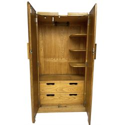 Early 20th century Art Deco period oak Gentleman's wardrobe, the interior fitted with shelves, hanging rails and two long drawers