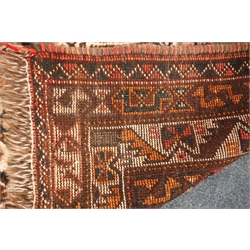  Persian style brown ground rug, three central medallions (300cm x 207cm) and a Persian style red ground rug (200cm x 135cm)  