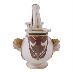 Royal Worcester double-ended vase, modelled in relief with mask panels in the classical dress the central handle with foliate and scroll work, H16cm 
