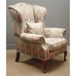  Late 20th century Liberty of London wingback armchair, upholstered in Liberty 'Lanthe' fabric, labelled to underneath  