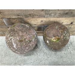 Two spherical stone gate post finials
