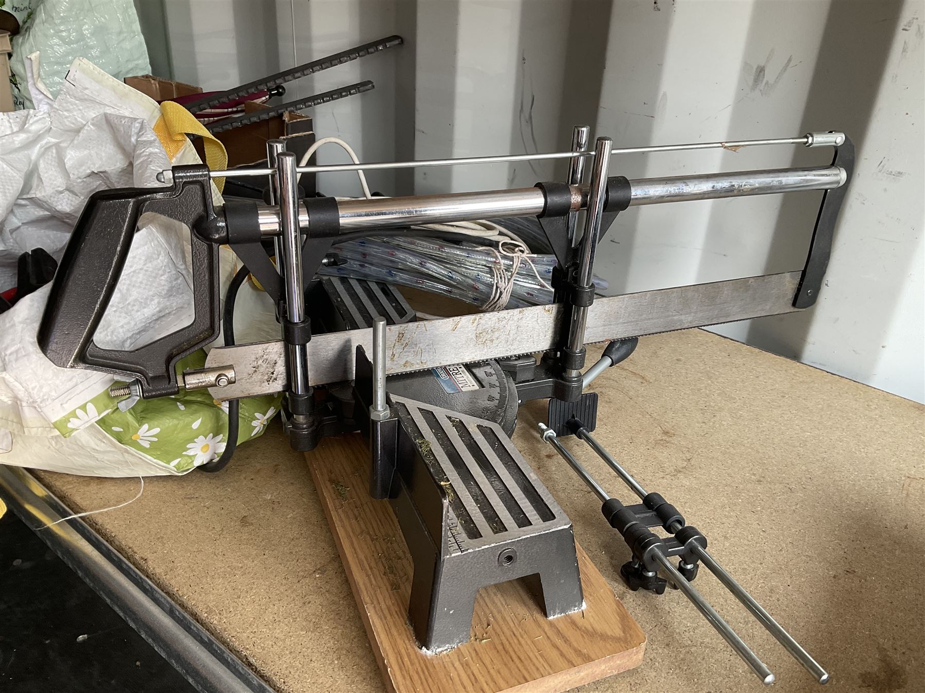 Draper mitre saw, outdoor light cable, metal clamps and other hand tools - THIS LOT IS TO BE COLLECTED BY APPOINTMENT FROM DUGGLEBY STORAGE, GREAT HILL, EASTFIELD, SCARBOROUGH, YO11 3TX