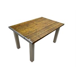 Rustic pine dining table, plank top with metal end caps, on square supports in grey paint and wax finish