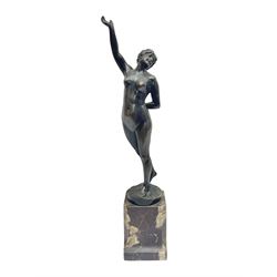 Bronzed nude female figure, holding a sphere behind her back, raised upon a red marble plinth, H40cm