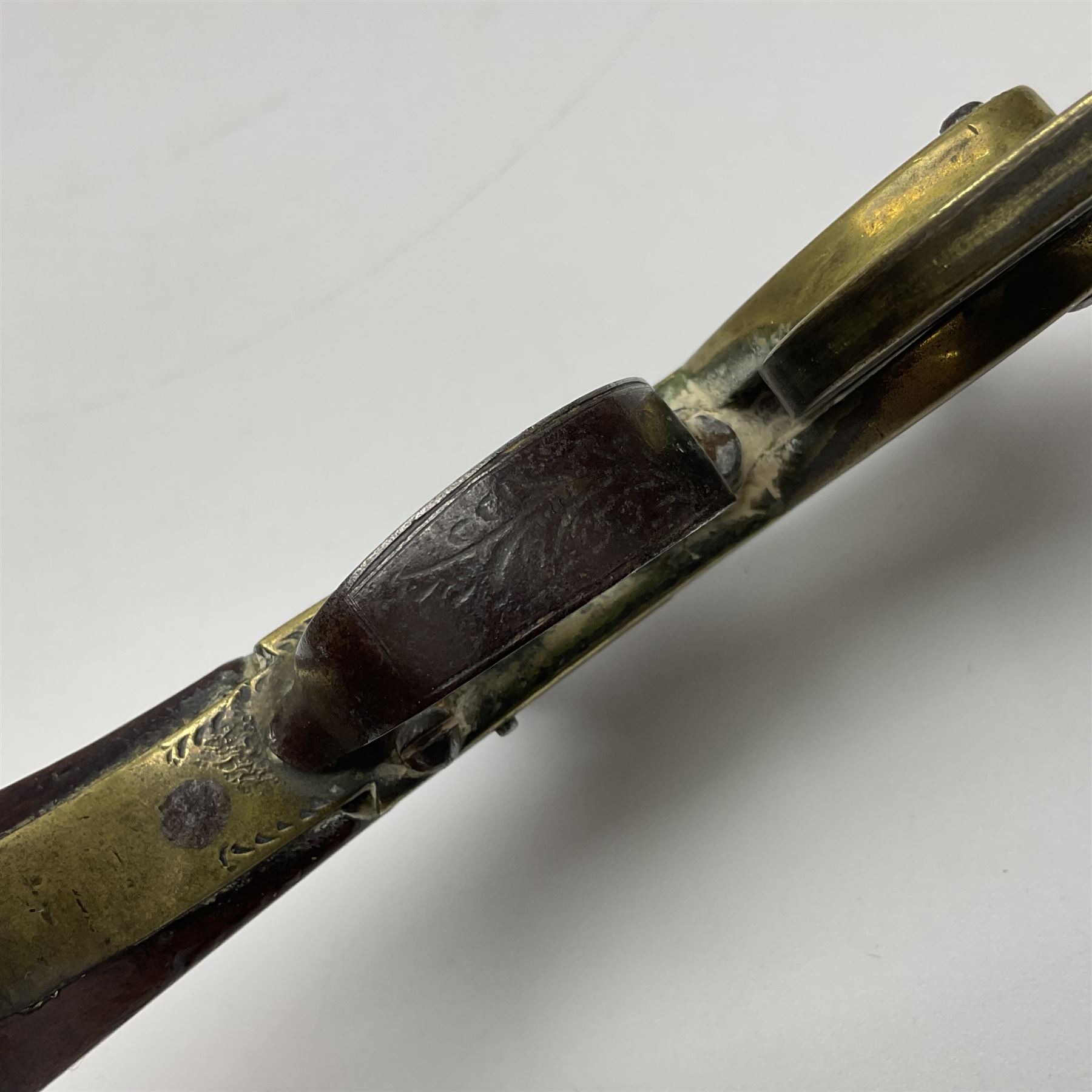 19th Century percussion eprouvette or gunpowder tester, with foliate engraved brass box lock and calibrated ratcheted wheel, steel trigger guard and walnut bag butt, L14cm