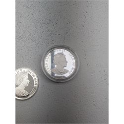Three Queen Elizabeth II Isle of Man one ounce fine silver coins, comprising 2016, 2018 one angels and 2018 one noble 