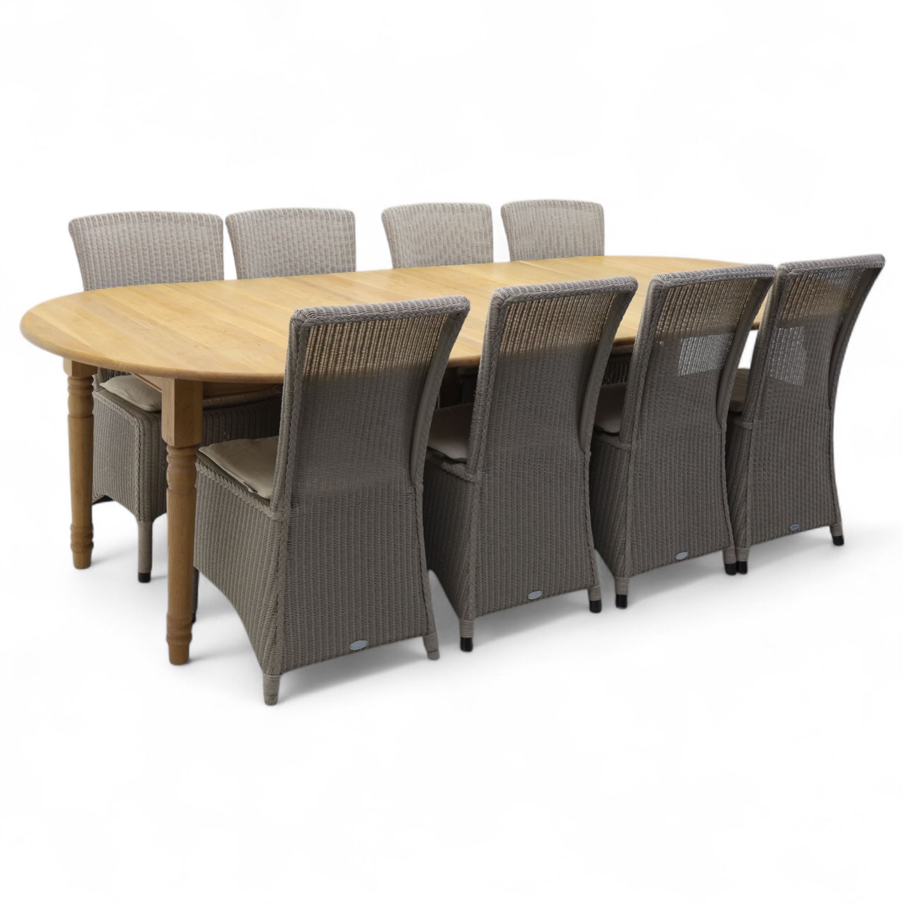 Neptune – Sheldrake limed oak extendable dining table and eight Havan loom chairs, the oval top in limed oak finish with four additional leaves extending the table to seat up to ten (Extends to cm), raised on turned legs with two additional centre supports, the matching Havan loom chairs finished in grey with cream upholstered seat covers (H 95cm, W 47cm, D 55cm)