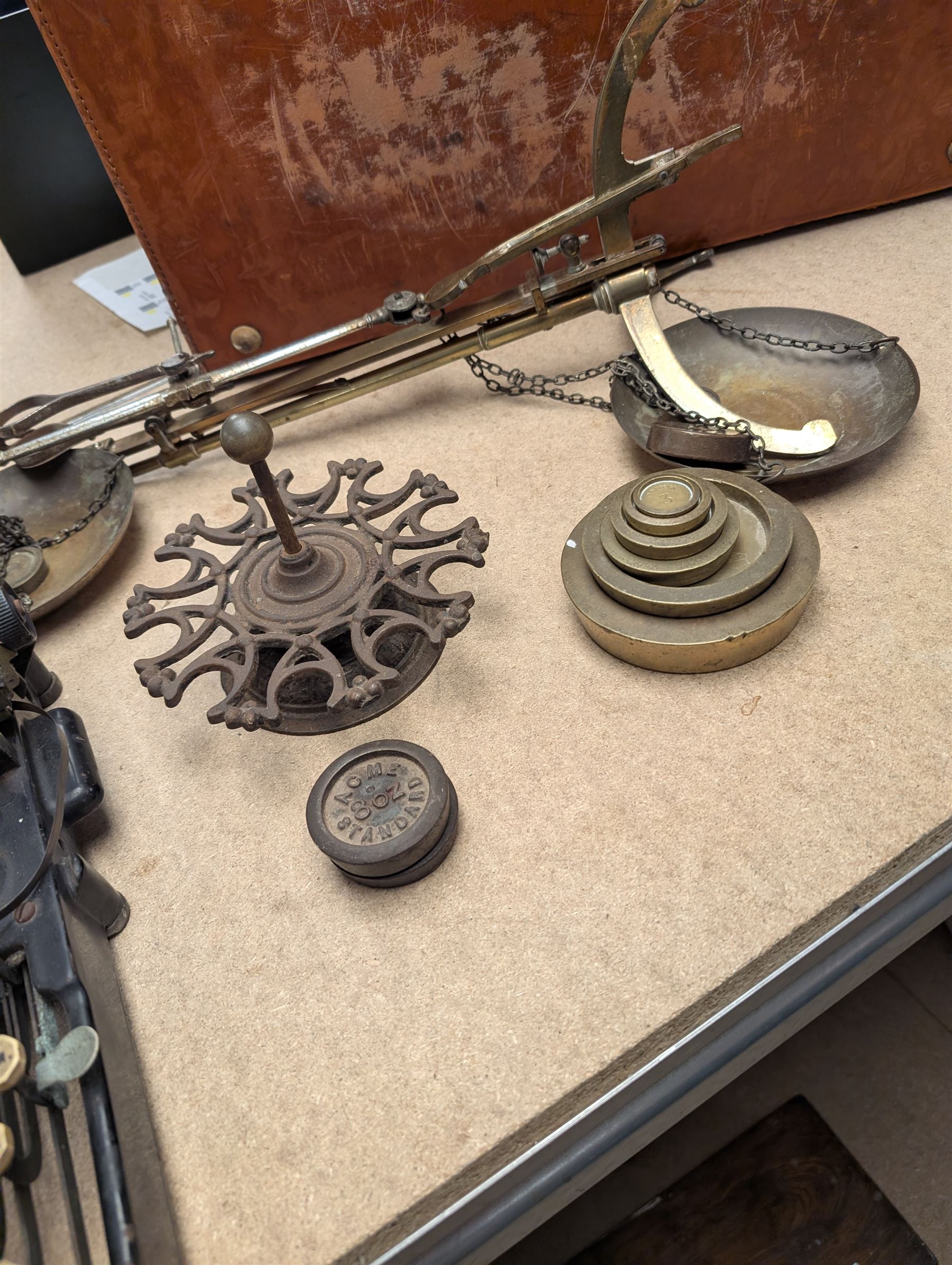 Large copper pan, brass jam pan, balance scales and weights, typewriter, leather suitcase and other metal ware