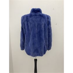 Modern cut lightweight skins lavender blue mink jacket, approx size 10 to 14, with elasticated cuffs, stand up small collar, black satin style lining, zip fastener, perfect condition as new, top class mink.
