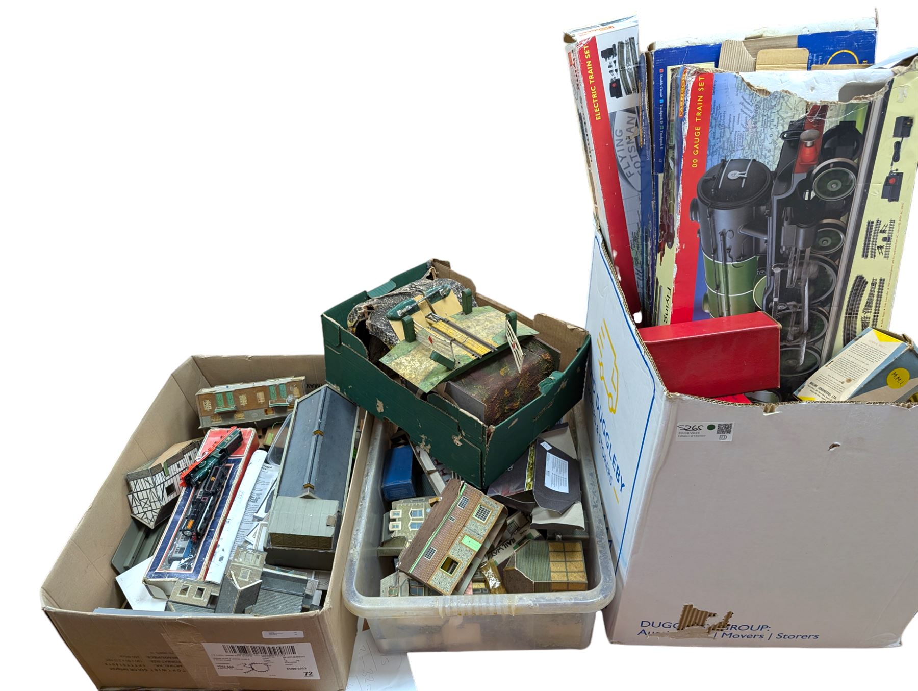 Collection of model railway buildings and other accessories, together with a box empty Hornby boxes, including three trainset boxes with pieces of track inside only