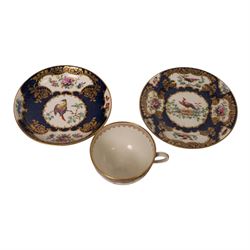 18th century Worcester trio, circa 1770,  painted with shaped panels of birds within a gilt boarder upon a blue scale ground with gilt detail to the rim, mark beneath, H7cm 