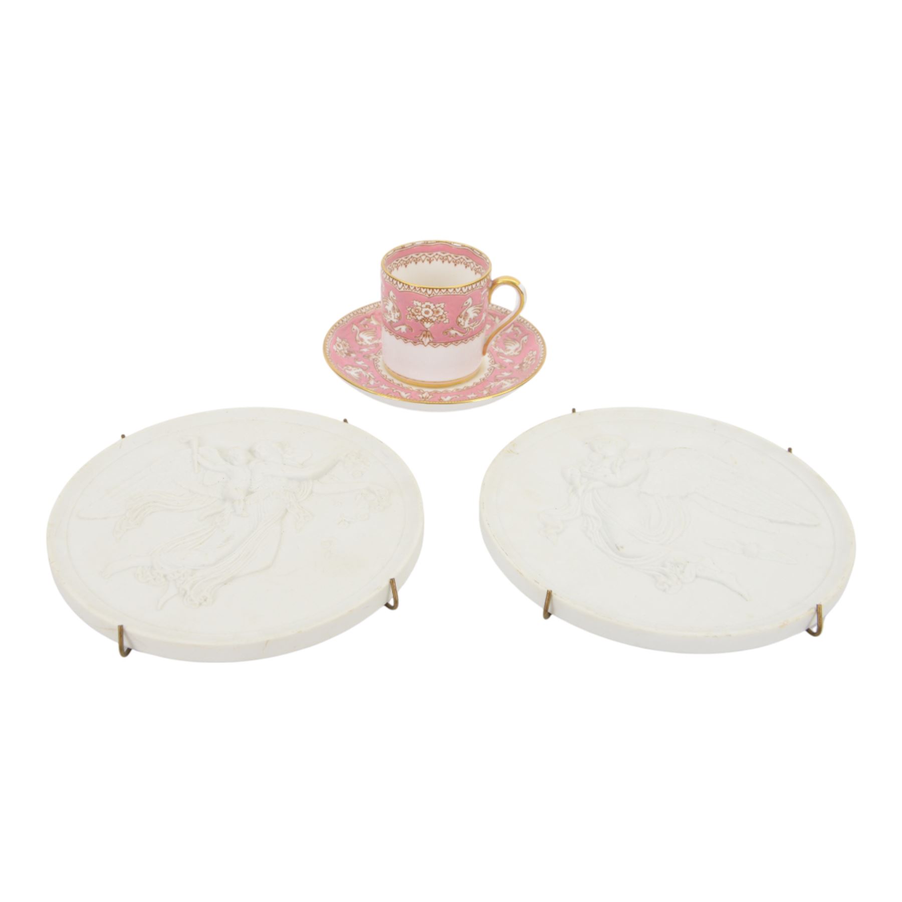 Royal Copenhagen parian ware circular plaques together with Crown Staffordshire cup and saucer
