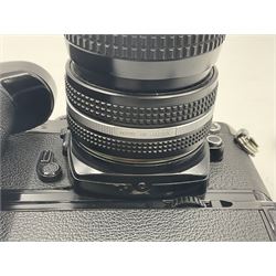 Nikon FM2n camera body, serial no. N8683100, with 'Nikon Zoom-NIKKOR 35-70mm 1:3.3-4.5' len, serial no. 2236565, Nikon MF-16 data back, serial no. 212905 and Nikon MD-12 Motor Drive, serial no 1570382 