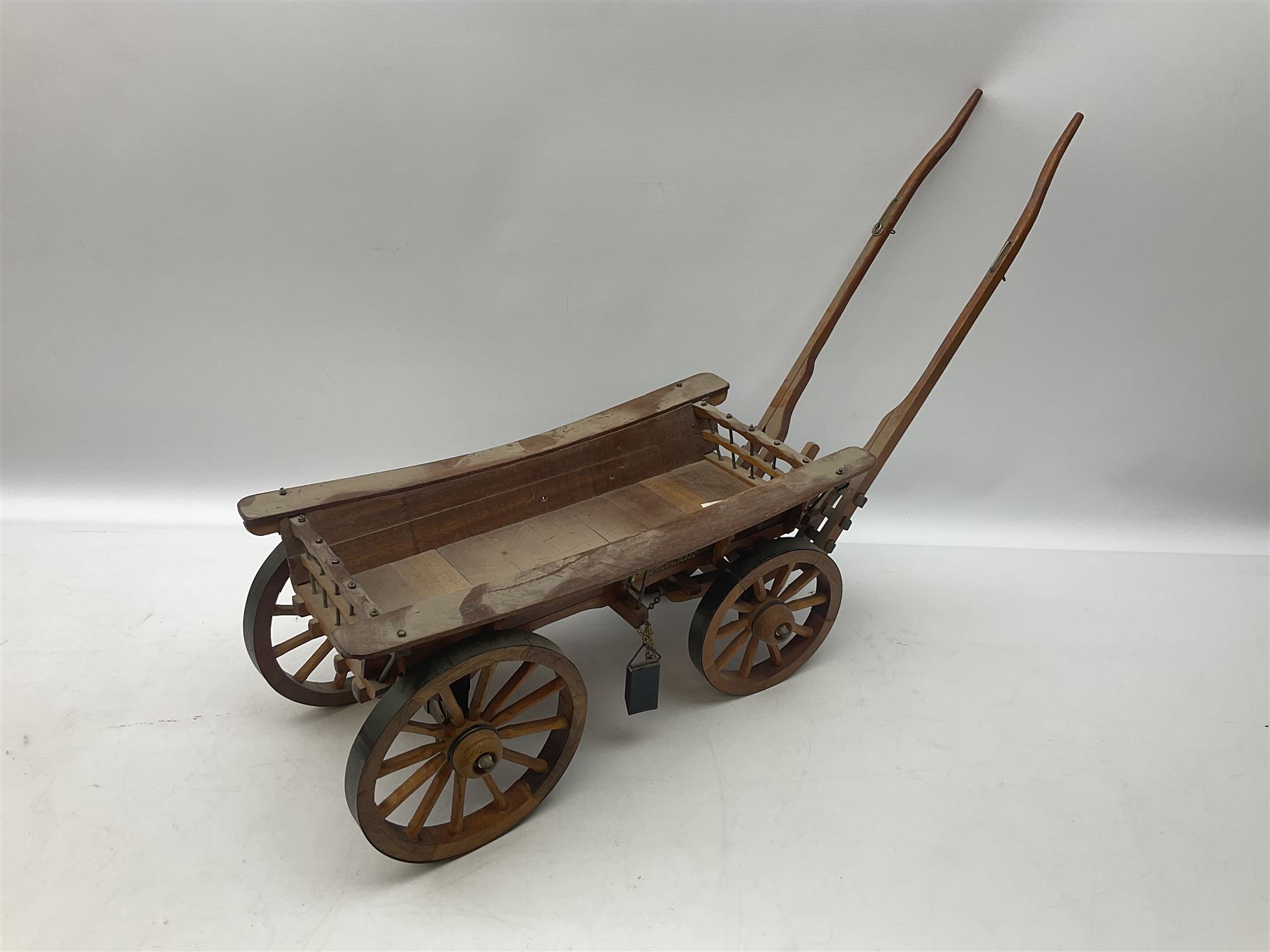 Approximately forty seven ceramic Shire horses to include Sylvac and Melba Ware examples of various sizes and colours, many with harnesses, and a quantity of carts and wagons 