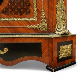 Late Victorian floral marquetry and ormolu mounted side cabinet, with white marble top above a frieze of floral inlay, single cupboard door revealing a shelved interior, with central floral bouquet panel within gilt-bronze border, flanked by gilt metal mounts of female masks and scrolls, on shaped plinth base