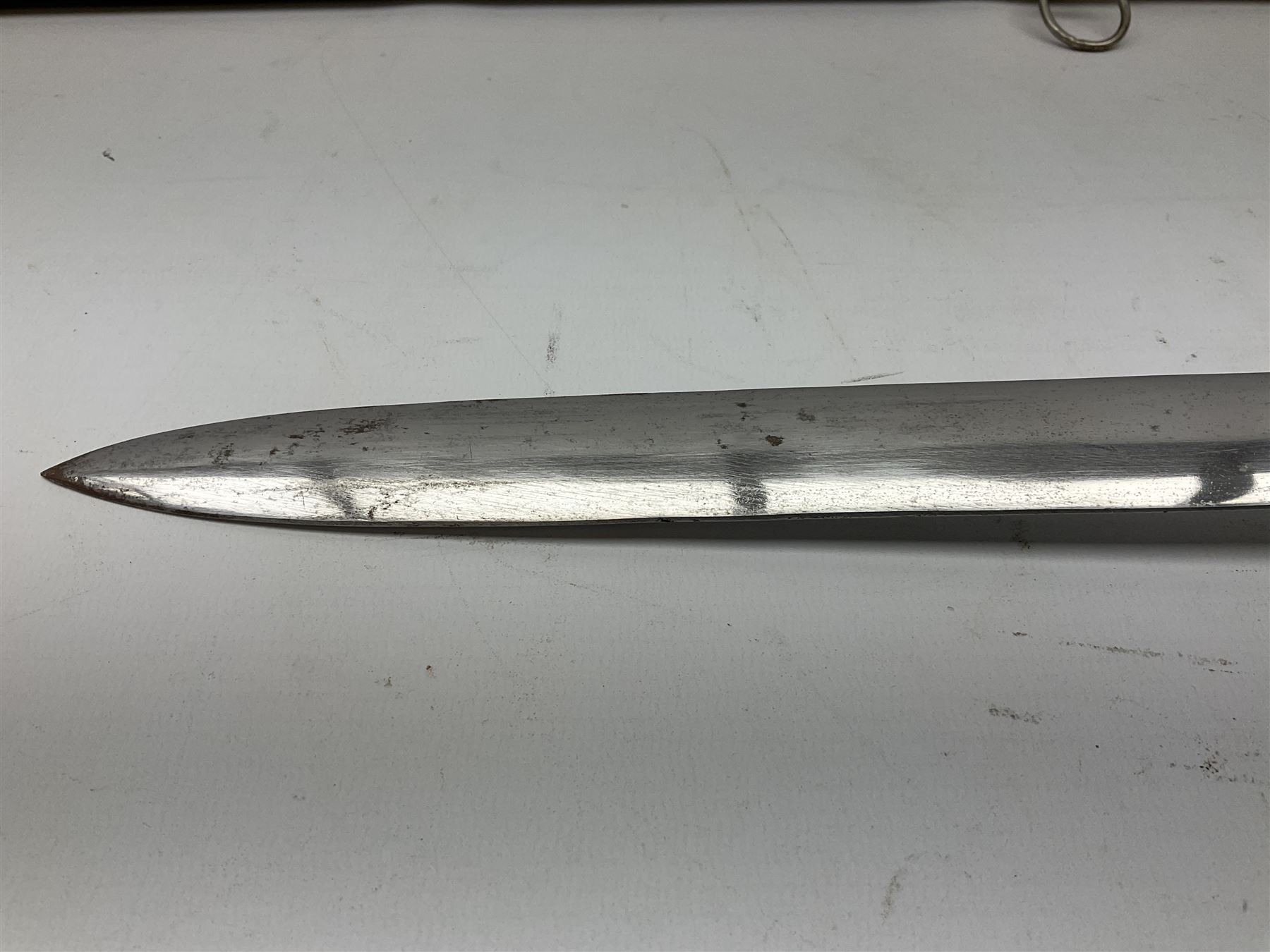 Reproduction Scottish basket hilted broadsword with 85cm double edged steel blade and red lined basket hilt with wire bound grip, in white metal mounted leather scabbard 107cm overall