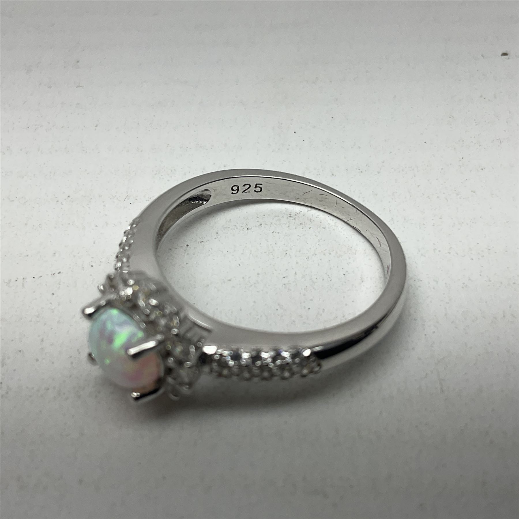 Silver opal and cubic zirconia cluster ring, stamped 925, boxed