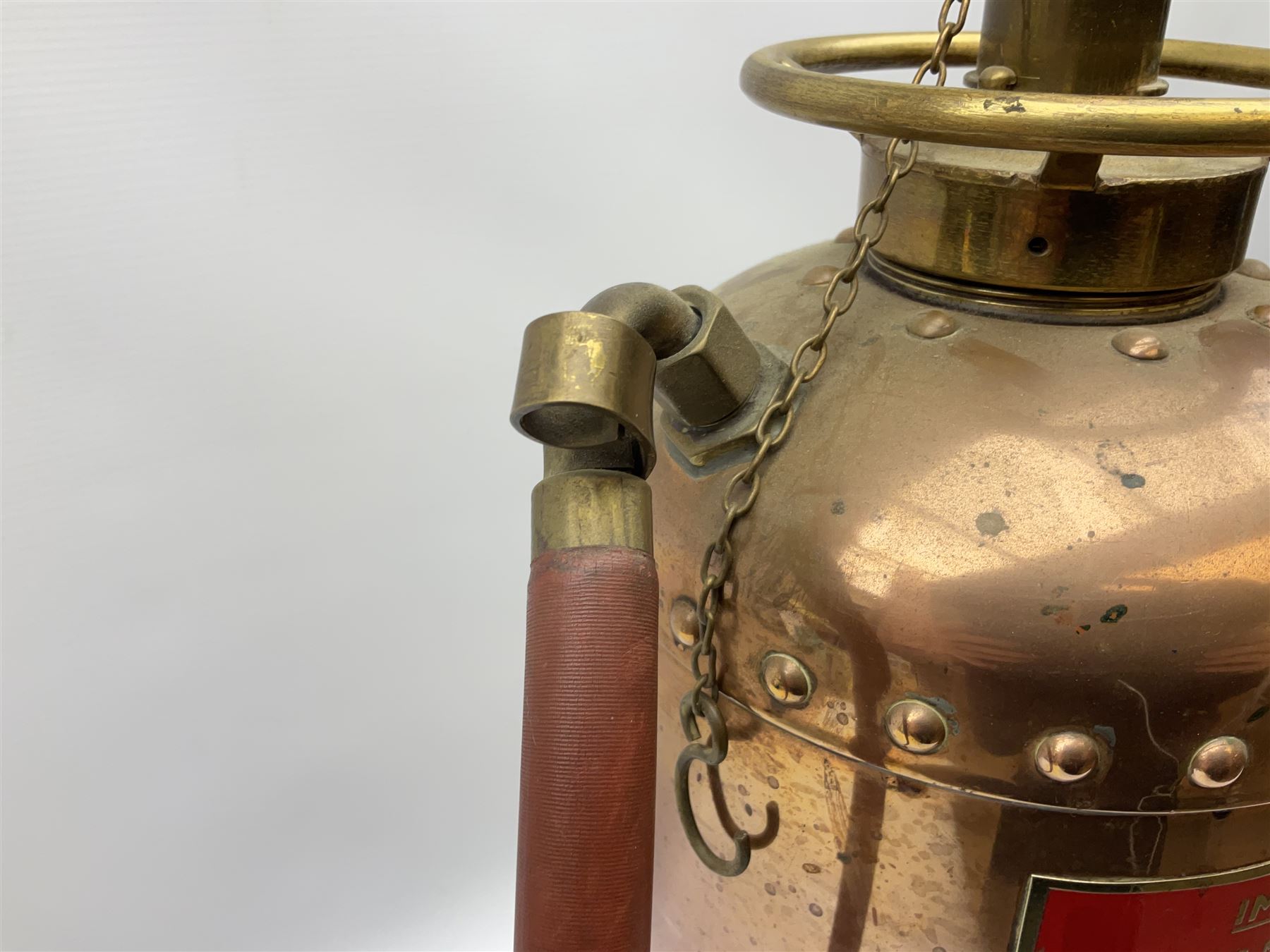 Large copper ‘Waterloo’ fire extinguisher by Read and Campbell Ltd and another Safex example 
