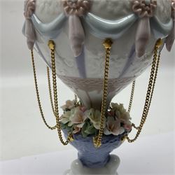 Lladro Flying High, modelled as a hot air balloon, with brass chains to suspended blossom filled basket, no 6523, with original box, H23cm