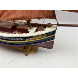 Wooden model of the Peterhead Herring Fishing Boat, Love Divine, PD404. on stand together with Wick Herring Fishing Boat, Galilee WK.1. on stand, L105cm, H64cm