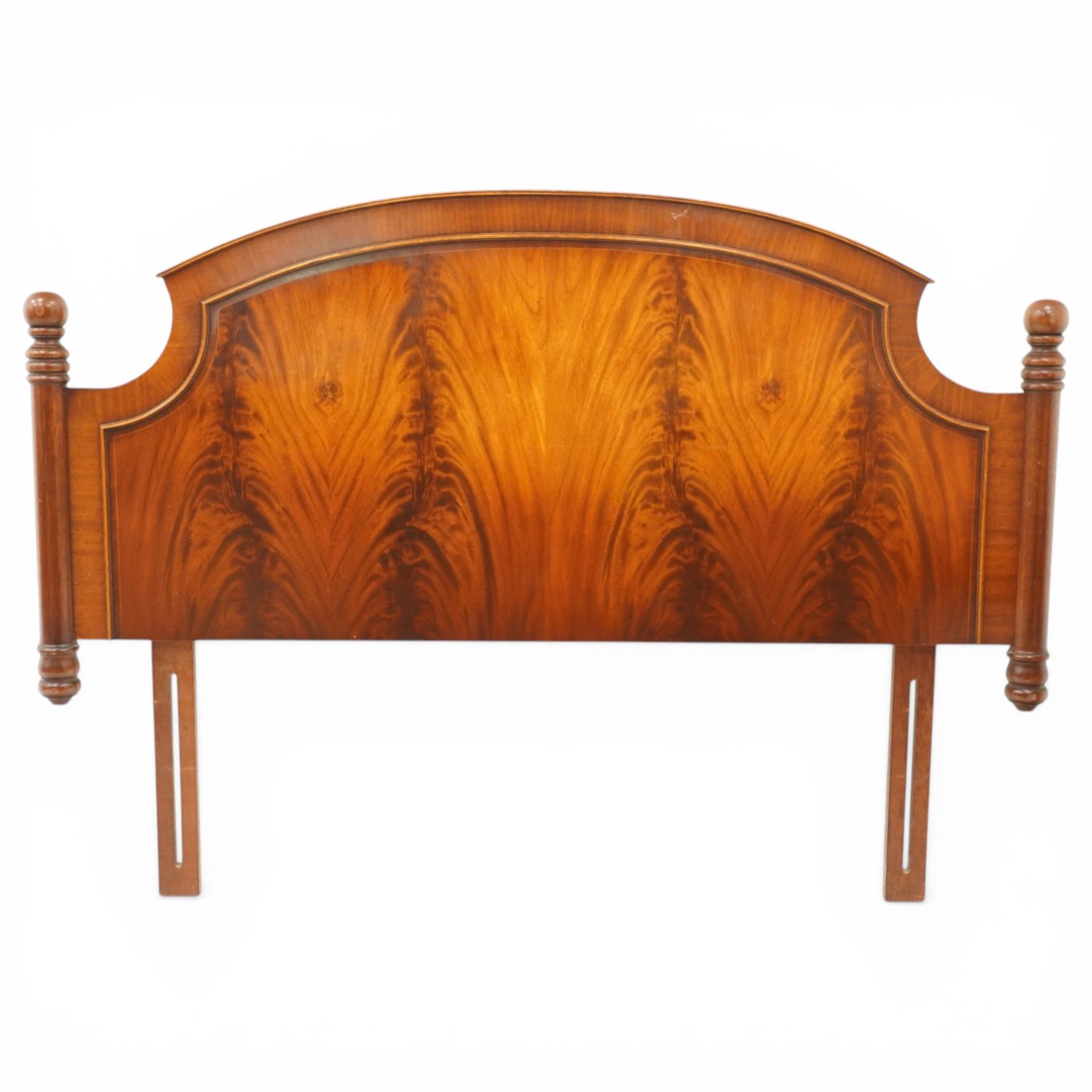 Two 20th century headboards, one with scrolled rail above a pink button backed board (H c127m, W 137cm) the second with flamed mahogany veneer (H 117cm, W 163cm)