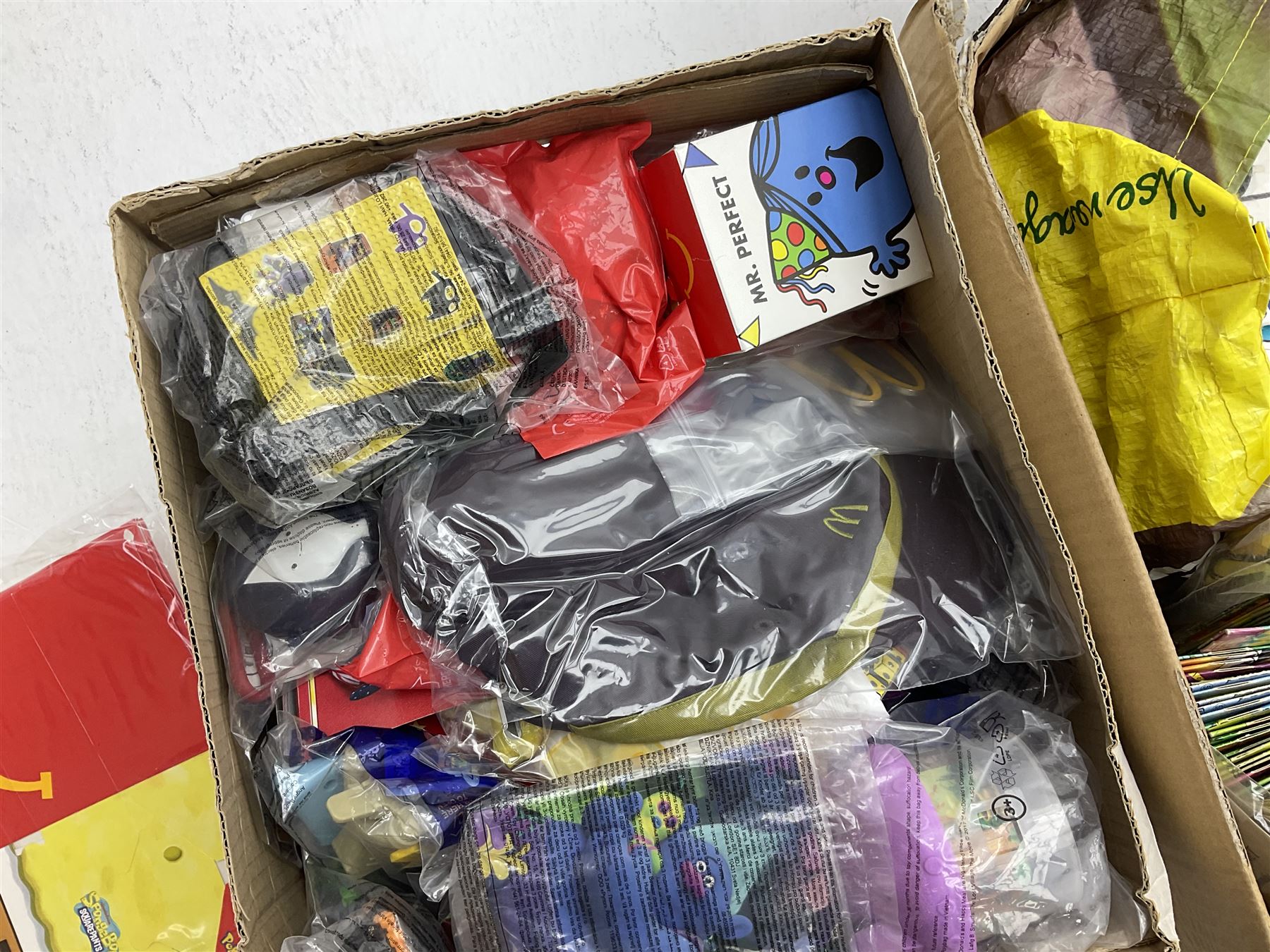 Two boxes of Mcdonalds memorabilia and merchandise