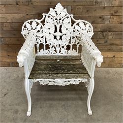 20th century Coalbrookdale design cast iron oak leaf and acorn armchair, white painted cast iron frame with slatted wooden seat, the pierced and shaped back decorated with scrolling oak branches and leafage, flanked by dog mask arm terminals over cabriole supports with paw feet