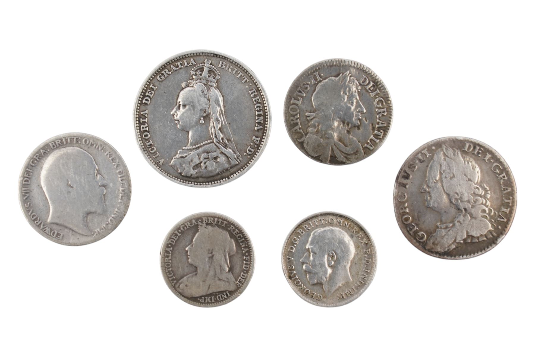Six silver coins including Charles II, George II, Victoria etc