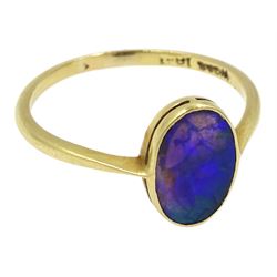 Gold single stone oval black opal ring, stamped 18ct, makers mark WG&S