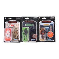 Thirteen Hasbro Kenner Star Wars The Mandalorian figures, including Retro Collection examples, comprising Kuill x2, The Armorer, The Child, Bo-Katan Kryze, R5-D4, IG-11, The Mandalorian, Cara Dune, Greef Karga, Moff Gideon x2 and Imperial Death Trooper, all carded
