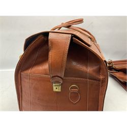 Tan leather holdall with three metal clasps to the front and impress decoration, together with another leather holdall; largest L55cm 
