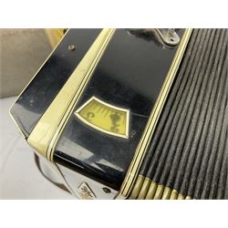 Scandalli Vibrante Three piano accordion in Art Deco black and white case with jewelled decoration, twenty-four keys and one-hundred and twenty buttons; inscribed '5700 Camerano Italia'; serial no.3414 L54cm; in carrying case with strap