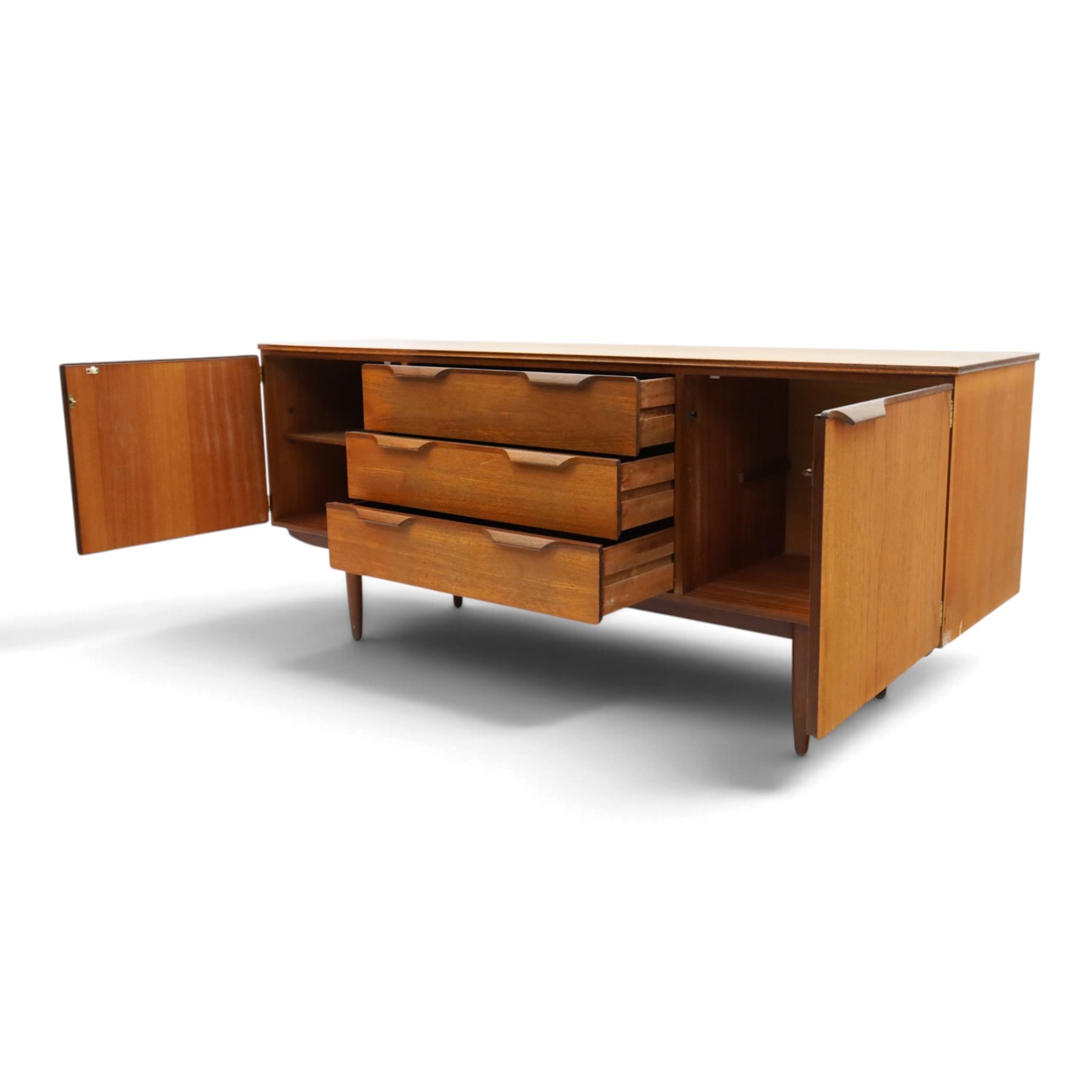 Frank Guille for Austinsuite - mid-20th century teak sideboard, fitted with three central graduating drawers flanked by cupboards, on tapering supports