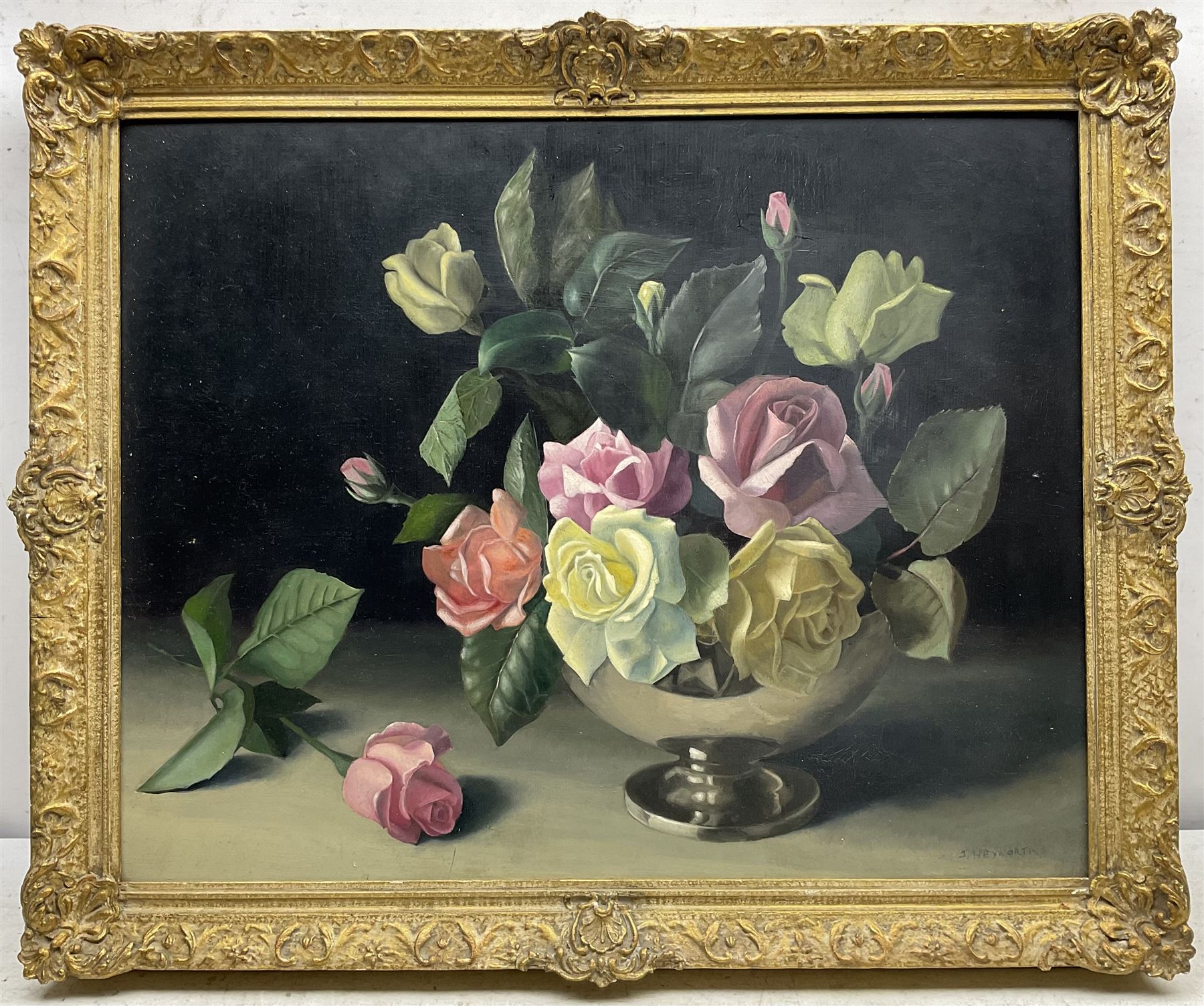 Jack Heyworth (20th century): Still Life of Roses, oil on board signed, artist's 'Haslingden' address label verso 39cm x 49cm