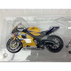 Three Minichamps 1:12 scale die-cast models of motorcycles - Suzuki GSX-R1000 Team Alstare Suzuki Corona Extra Troy Corser WSB 2005; Yamaha YZR-M1 Gauloises Yamaha Team Colin Edwards MotoGP Laguna Seca 2005; and Honda NSR 500 Loris Capirossi MotoGP 2002; all boxed (3)