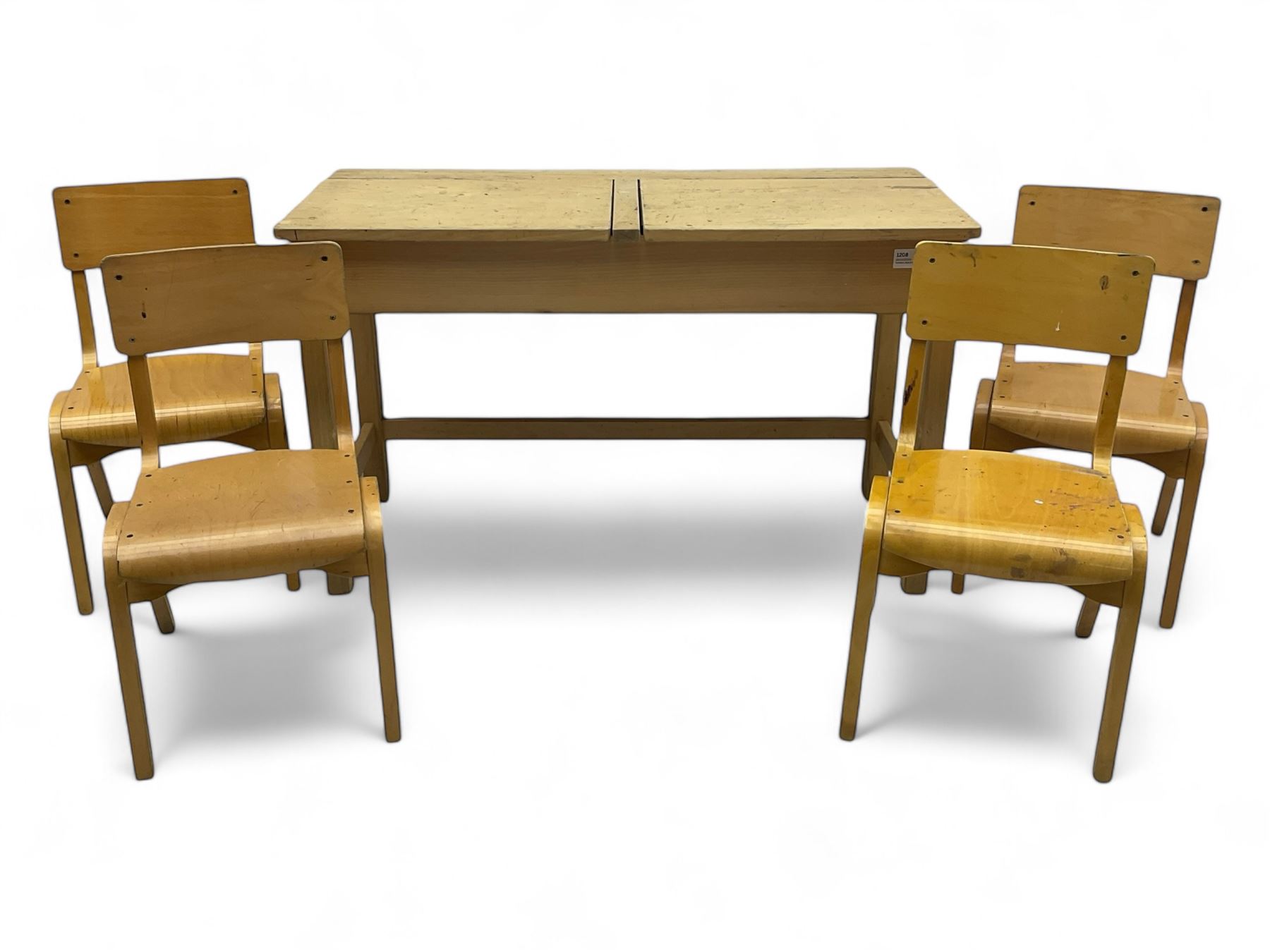 Mid-20th century beechwood school desk, rectangular lift-top desk with storage compartment, supported by square legs with cross stretchers; four matching beech chairs (5)