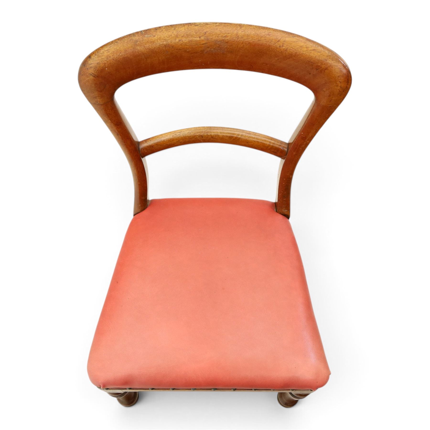 Set of four Victorian mahogany balloon back chairs, with red leather seats 