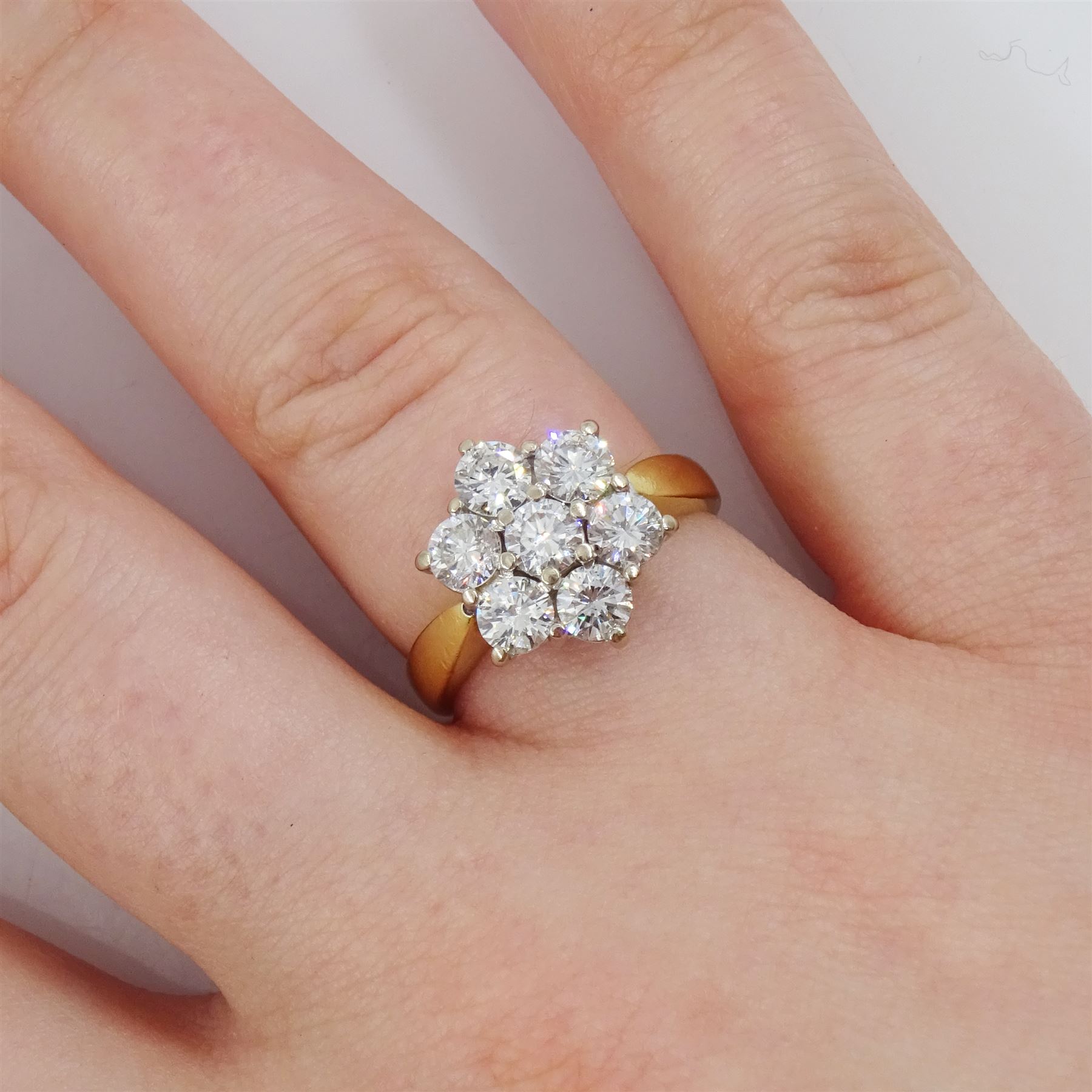 18ct gold seven stone, round brilliant cut diamond, flower head cluster ring, London 1988, total diamond weight approx 1.45 carat