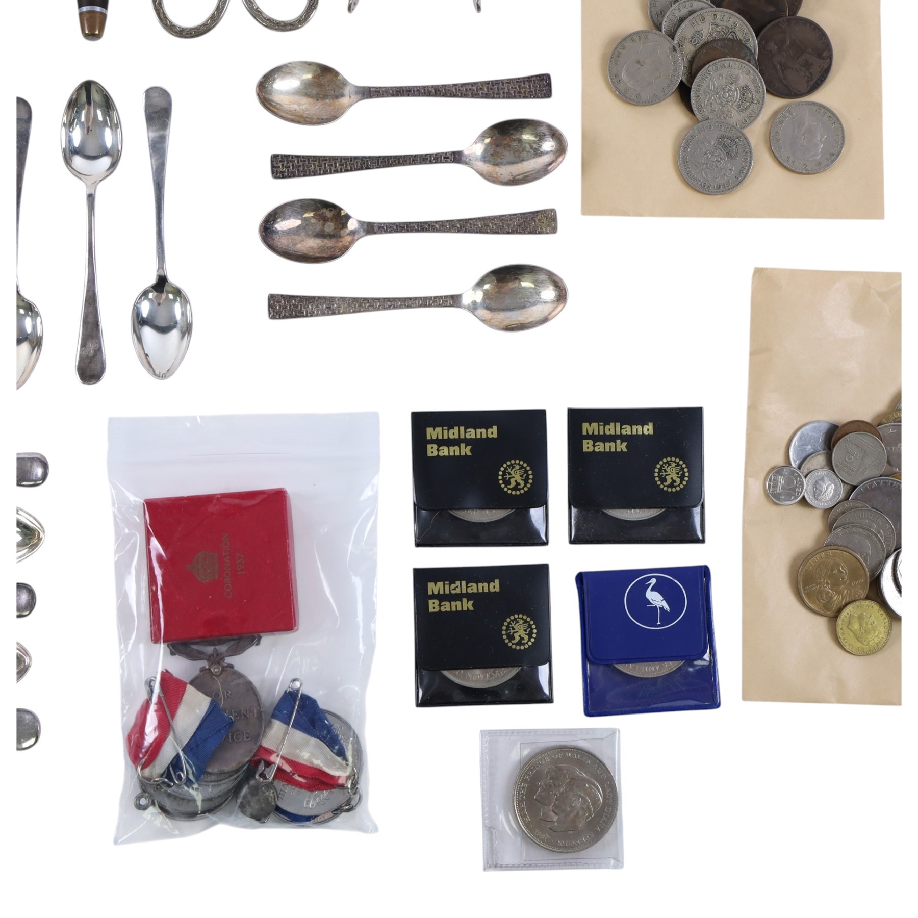 Collection of medals and coins, including Territorial Efficiency Medal, 1889 Amercian Morgan Silver Dollar, 1940 silver shilling, George IV coronation medal, Victorian and Edwardian pennies, commemorative coins etc and a quantity of silver plated cutlery