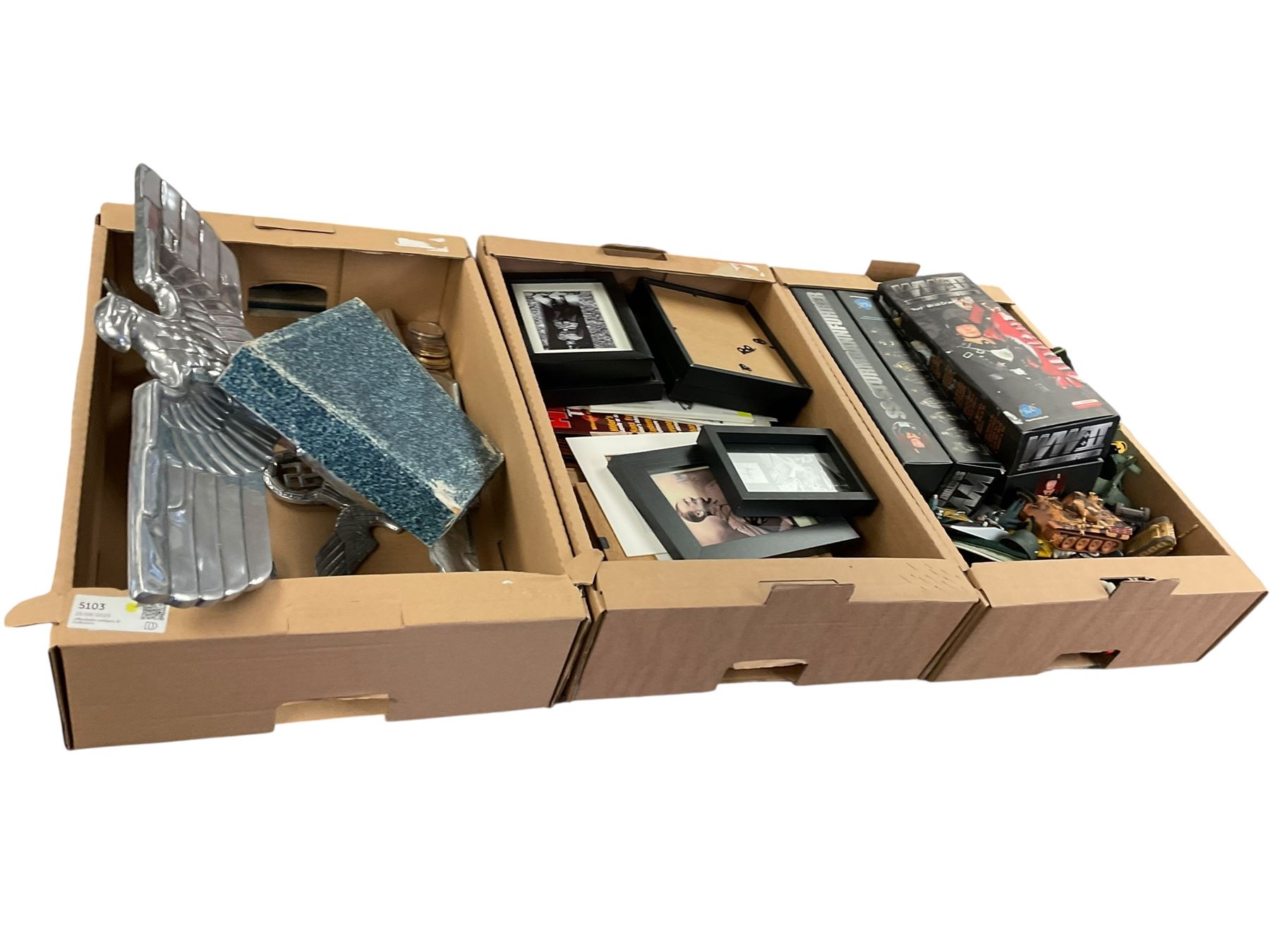 Collection of replica German WWII items, including solider figures, street sign etc, in three boxes 
