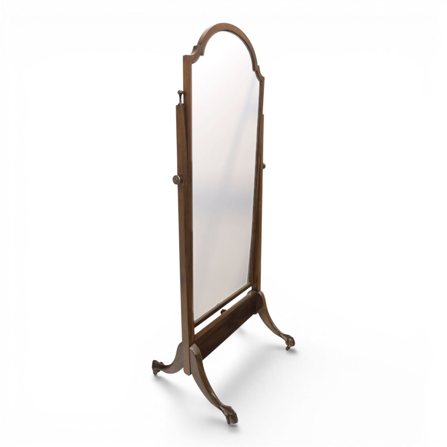 Georgian style mahogany cheval mirror, arched rectangular mirror plate within a moulded frame, on turned supports with brass adjustment mounts, raised on downswept supports terminating in claw feet